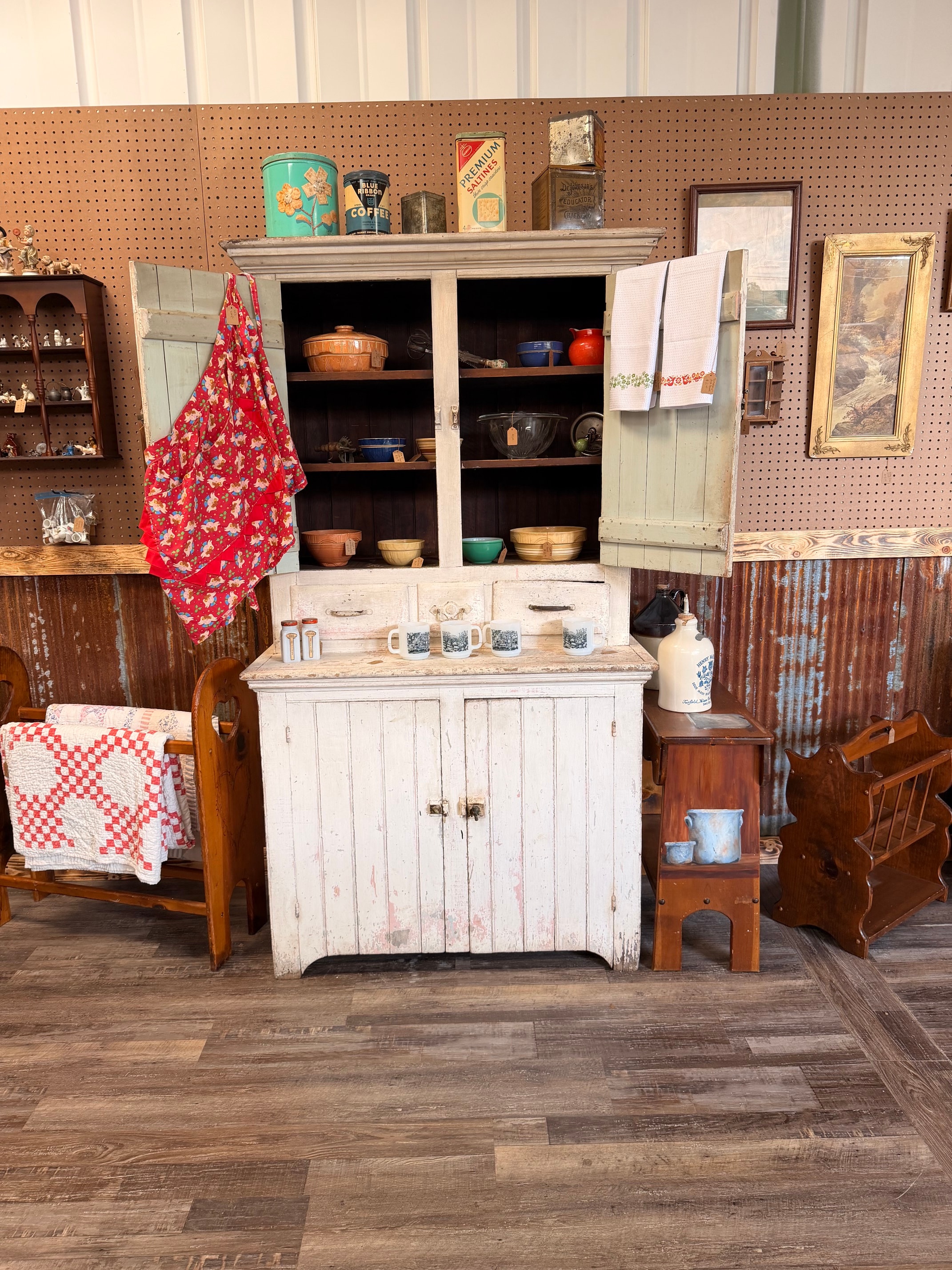 Antique hoosier cabinet and vintage kitchenware booth